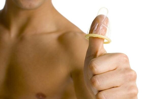 the condom on the finger symbolizes the enlargement of the teen's penis